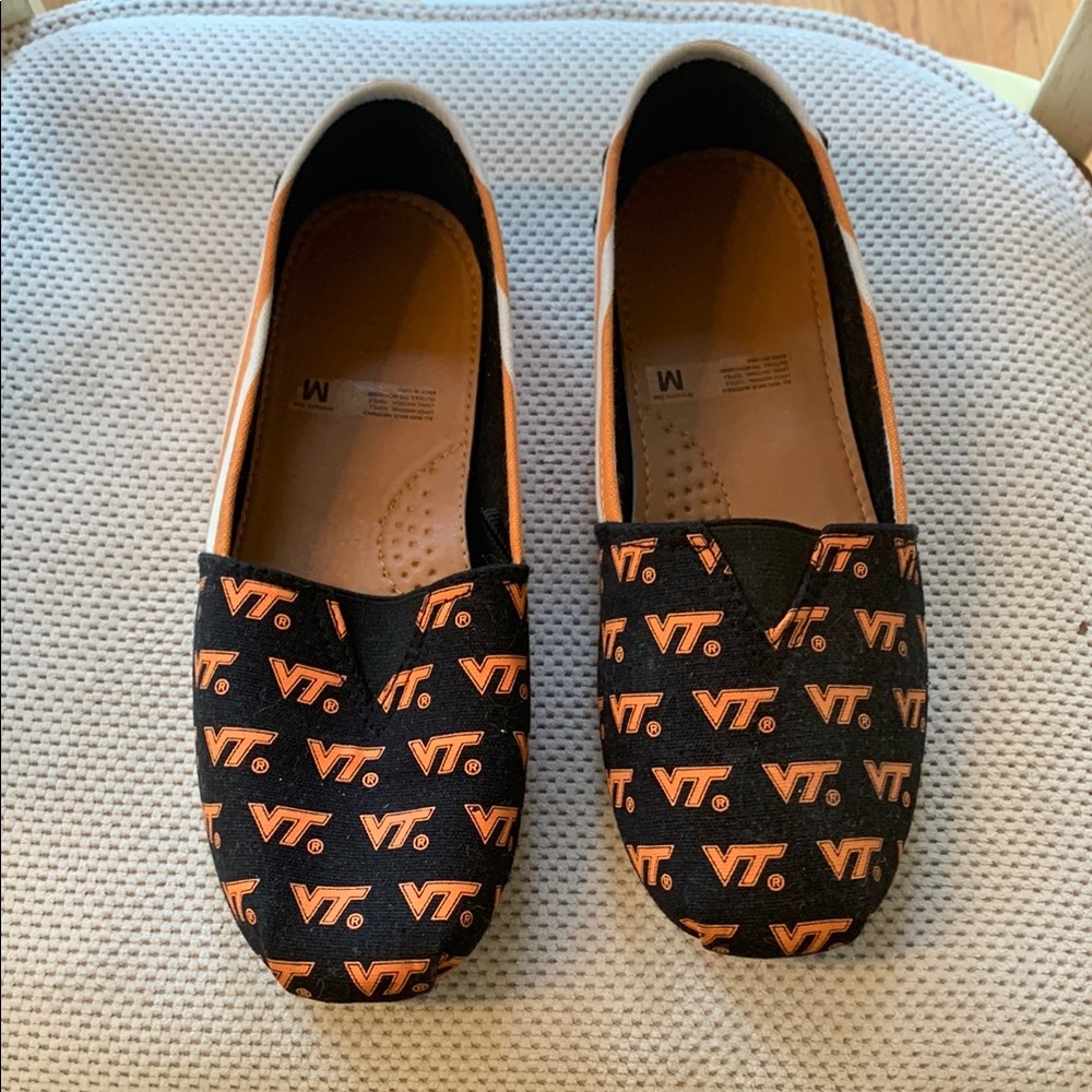 Black and Orange VT Slip-On Shoes. Lightly worn
